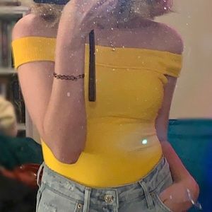 yellow bodysuit